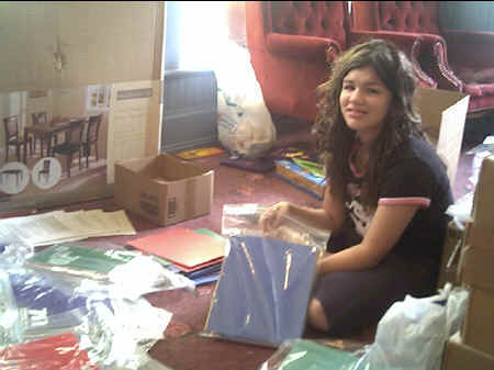 Brittany putting together Operation Iraqi Child kits